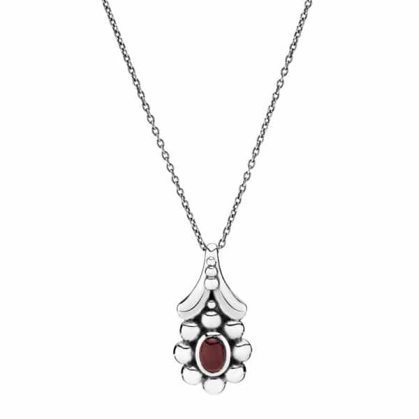 Lund Copenhagen halskæde i sølv med oxyderet blomst og rød granat
